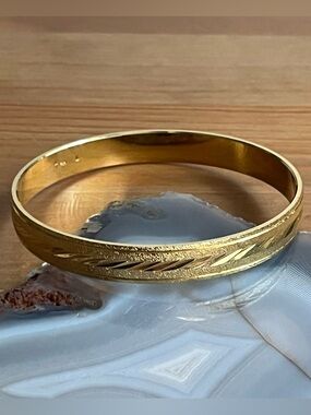 Vintage Trifari gold-tone bangle bracelet, etched design women's jewelry